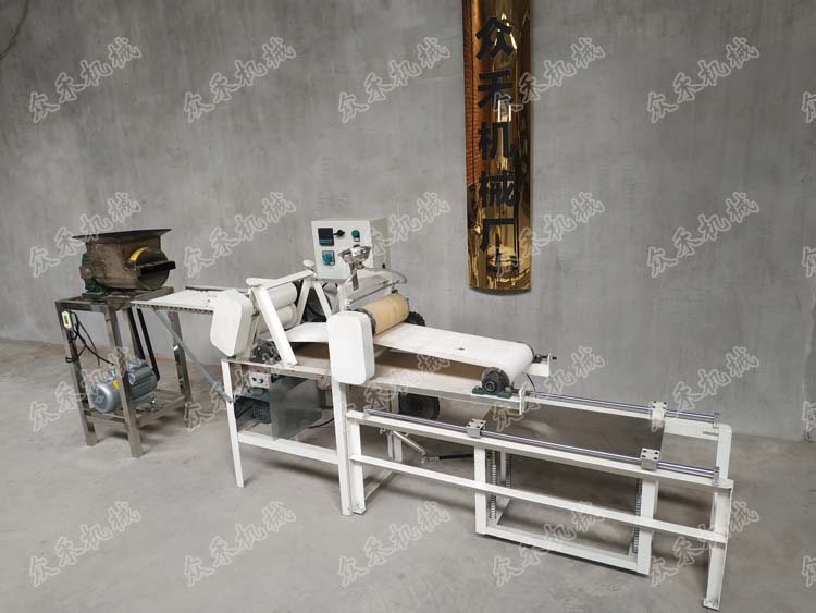 價(jià)格實(shí)惠的搟面皮機(jī)多少錢一臺數(shù)控仿手工搟面皮機(jī)